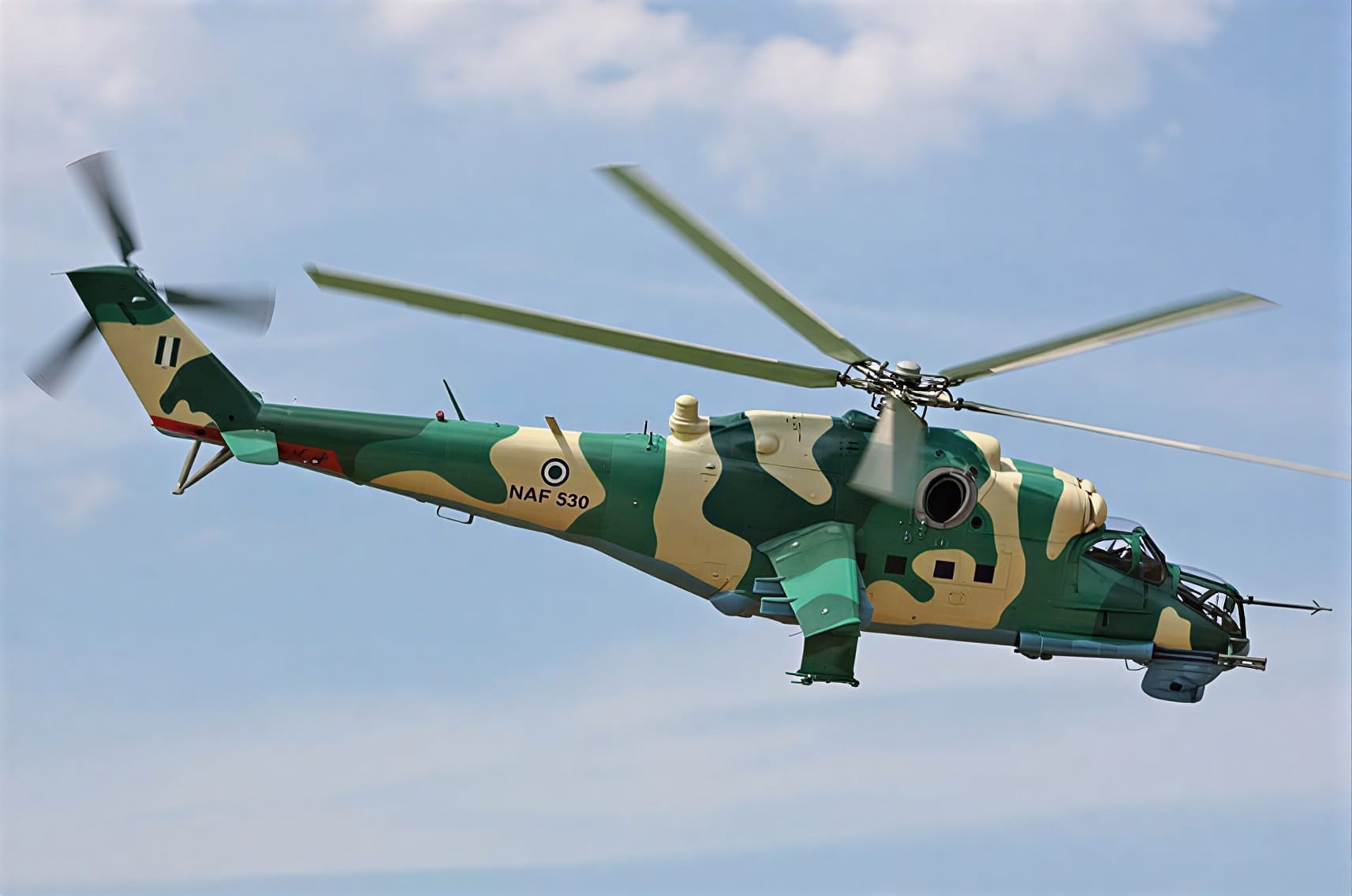 Nigerian Air Force Mi-35 attack helicopter NAF 530 in flight